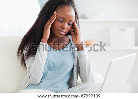 Laptop causes headache to young woman