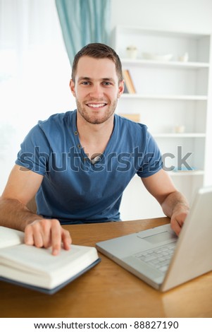 Male student happy about research results