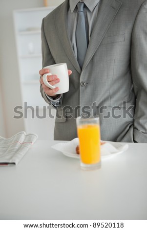 Portrait of a breakfast taken by a businessman in his kitchen