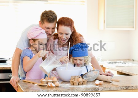 Happy family having a great time baking together