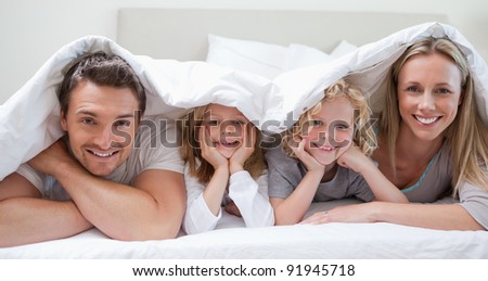 Family under the cover together