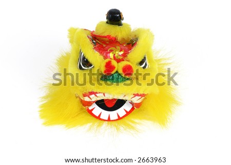 Lion head isolated over white. This head is used for the chinese lion dance.