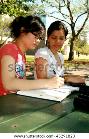 Two female students working together