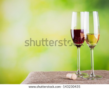 Two wine glasses on natural background