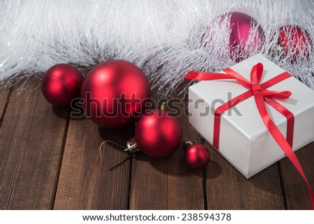 Red presents in white box. New Years background.