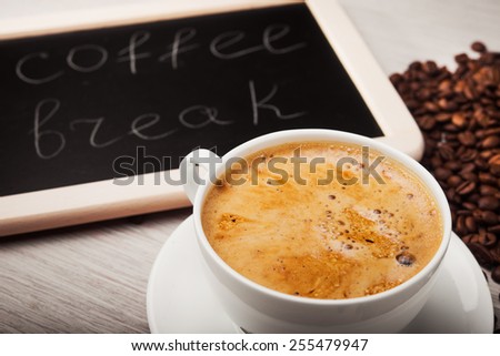 Break for a cup of organic coffee on background