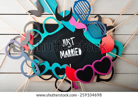Wedding accessories set on wooden background