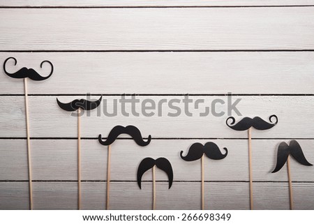 Wedding accessories set mustache on white table