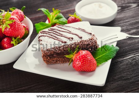 Food dessert with chocolate cake and fruit strawberry