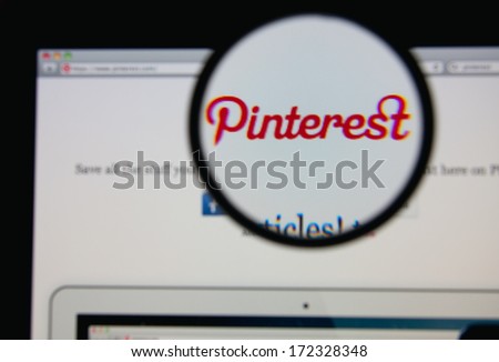 LISBON JANUARY 20 2014 Photo of Pinterest homepage on a monitor screen through a magnifying glass LISBON JANUARY 20 2014 Photo of Pinterest homepage on a monitor screen through a magnifying glass