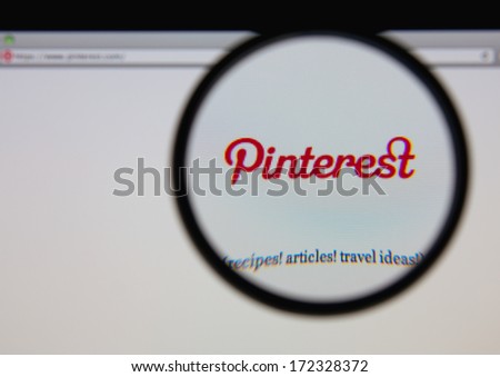 LISBON JANUARY 20 2014 Photo of Pinterest homepage on a monitor screen through a magnifying glass LISBON JANUARY 20 2014 Photo of Pinterest homepage on a monitor screen through a magnifying glass