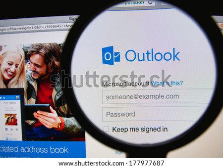LISBON PORTUGAL FEBRUARY 21 2014 Photo of Outlook homepage on a monitor screen through a magnifying glass LISBON PORTUGAL FEBRUARY 21 2014 Photo of Outlook homepage on a monitor screen through a magnifying glass