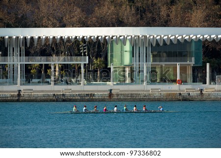 MALAGA, SPAIN - FEBRUARY 29:  Team of women train for the next row competition in front of the new pier on February 29, 2012 in Malaga, Spain.