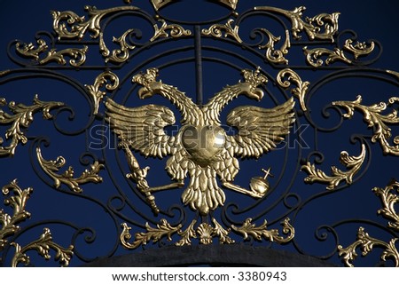 Gold double eagle on gate of Ekaterininsky Palace in Pushkin, Saint-Petersburg, Russia