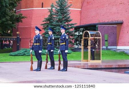 MOSCOW - AUGUST 30: Guards of honor at the Eternal flame on August 30, 2012 in Moscow. A primary role for honor guards is to provide funeral honors for fallen comrades and to guard national monuments.