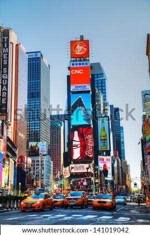 New York City - May 12: Times Square On May 12, 2013 In New York City. Iconified As &Quot;The Crossroads Of The World&Quot; It\'S The Brightly Illuminated Hub Of The Broadway Theater District.