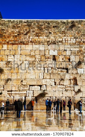 JERUSALEM - DECEMBER 15: The Western Wall in the night on December 15, 2013 in Jerusalem. It's located in the Old City of Jerusalem at the foot of the western side of the Temple Mount.
