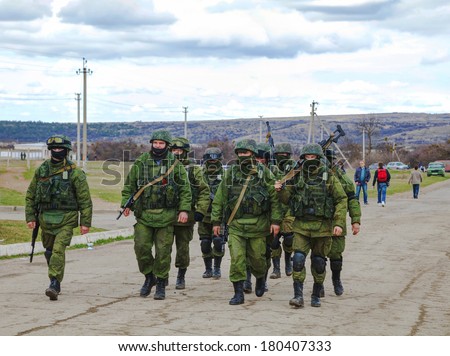 PEREVALNE UKRAINE MARCH 5 Russian soldiers marching on March 5 2014 in Perevalne Crimea Ukraine On February 28 2014 Russian military forces invaded Crimea peninsula PEREVALNE UKRAINE MARCH 5 Russian soldiers marching on March 5 2014 in Perevalne Crimea Ukraine On February 28 2014 Russian military forces invaded Crimea peninsula