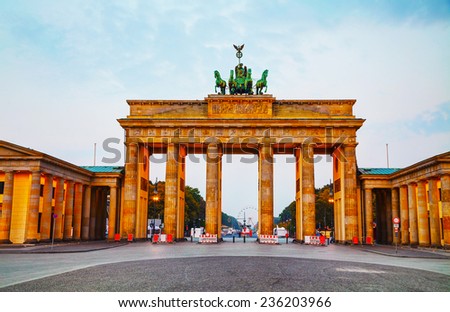 Brandenburg gate (Brandenburger Tor) in Berlin, Germany at sunrise