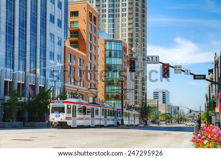 SALT LAKE CITY - May 2: Street overview with a tram on May 2, 2014 in Salt Lake City, Utah. SAlt Lake is the capital and the most populous city in the state of Utah.