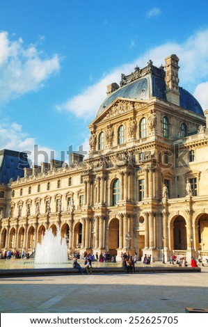 PARIS - OCTOBER 9: The Louvre museum on October 9, 2014 in Paris, France. The Louvre Museum is one of the world\'s largest museums and a historic monument and a central landmark of Paris.