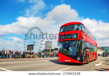 LONDON - APRIL 5: Iconic red double decker bus on April 5, 2015 in London, UK. The London Bus is one of London\'s principal icons, the archetypal red rear-entrance Routemaster recognised worldwide.