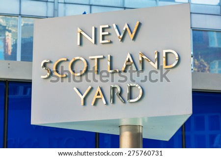 LONDON - APRIL 12: Famous New Scotland Yard sign on April 12, 2015 in London, UK. It\'s a metonym for the headquarters of the Metropolitan Police Service, the territorial police force of London.