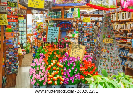 AMSTERDAM - APRIL 17: Souvenir shop at the floating flower market on April 17, 2015 in Amsterdam, Netherlands. It\'s usually billed as the world\'s only floating flower market.