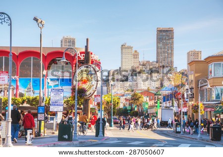 SAN FRANCISCO - APRIL 24: Famous Fisherman\'s Wharf on April 24, 2014 in San Francisco, California. It\'s one of the busiest and well known tourist attractions in the western United States.
