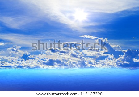 Ocean, blue sky and white clouds