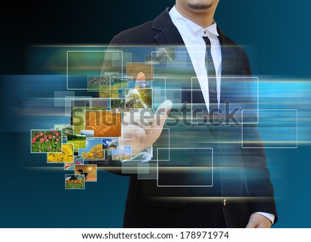 businessman touch green Earth in hands and Reaching images streaming
