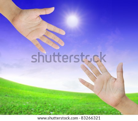 A hand is reaching out in the sky for help