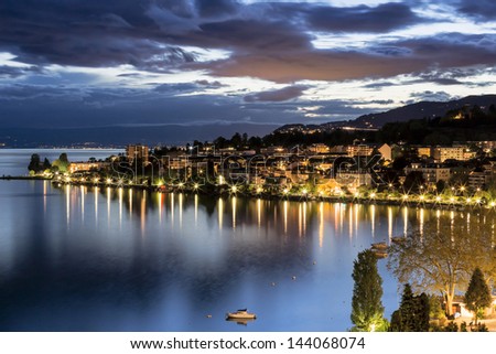 View Onto Surrounding Buildings In Montreux By Night