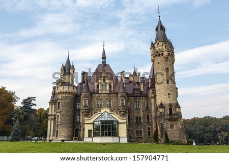 MOSZNA, POLAND - OCTOBER 09: Moszna Palace, built in the XVII century, extended from 1900 to 1914, Thiele-Winckler Silesian family residence from 1866 to 1945, in Moszna in Poland on October 09, 2013