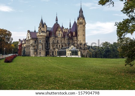 MOSZNA, POLAND - OCTOBER 09: Moszna Palace, built in the XVII century, extended from 1900 to 1914, Thiele-Winckler Silesian family residence from 1866 to 1945, in Moszna in Poland on October 09, 2013