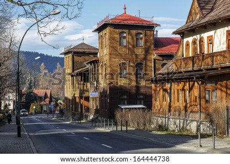 ZAKOPANE - NOVEMBER 18: Bezimienna and Pomorze, two wooden villas in Tyrolean style built in 1894 as a dowry for the daughters of the family Langier, in Zakopane in Poland 2013 on November 18, 2013