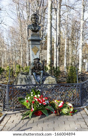 ZAKOPANE - NOVEMBER 17: Monument to famous Jan Krzeptowski Saba and Tytus Chalubinski, done in 1903 by Jan Malborczyk and designed by Stanislaw Witkiewicz in Zakopane in Poland on November 17, 2013