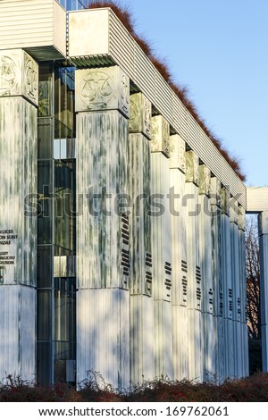 WARSAW - DECEMBER 28: Detail of Supreme Court Building, on its 63 columns shows 86 maxims of law and names of combat units involved in the 1944 Warsaw Uprising, in Warsaw, Poland on December 28, 2013