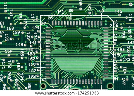 Green printed circuit board shown from the electrical paths side