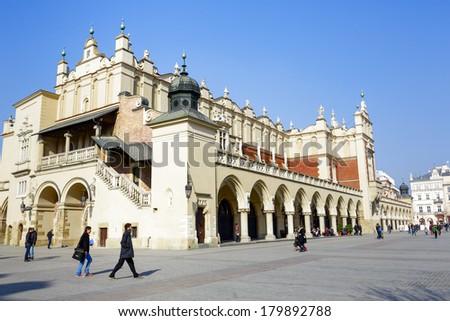 KRAKOW, POLAND - FEBRUARY 26, 2014: Sukiennice, The Cloth Hall, present shape built from 1875 to 1879 by the project of Tomasz Prylinski, nowadays souvenir shops and the Gallery of the Polish art