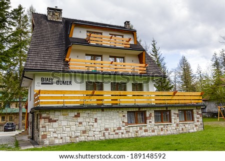 ZAKOPANE, POLAND - APRIL 20, 2014: Bialy Domek, made of brick guest house, offers 15 guest rooms, located in close proximity to the city center
