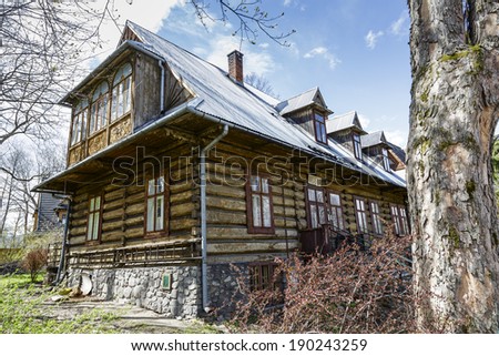 ZAKOPANE, POLAND - APRIL 20, 2014: Wooden Villa Wiosna built around year 1900, at Sienkiewicza street, with historic features listed in the municipal register of architectural heritage in the city