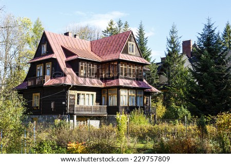 ZAKOPANE, POLAND - OCTOBER 14, 2014: Wooden villa called Ros-Ami built in 1937, listed in the municipal register of architectural heritage