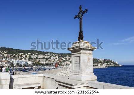 NICE, FRANCE - MAY 18, 2014: The iron cross recalls important moments in the history of the State, From the inscription placed on a pedestal can be learn: In Memory of Jubilee 1829 and the Peace 1871