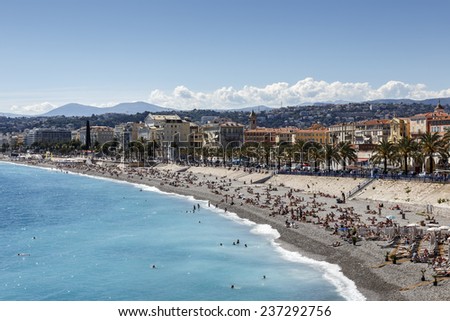 NICE, FRANCE - MAY 24, 2014: Buildings of the city, sea shoreline and beaches, there are approx. 30 beaches spread over 7 km long coastline in the City