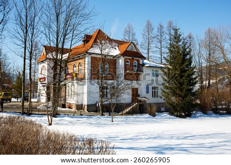 ZAKOPANE, POLAND - MARCH 09, 2015: Villa Made of brick, built for Dr. Rozycki, design by E. Wesolowski in 1913, listed in the municipal register of architectural heritage, nowadays Alior Bank branch