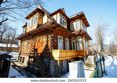 ZAKOPANE, POLAND - MARCH 09, 2015: Villa named Ostoja built in 1907 in Zakopane style with historic features listed in the register of architectural heritage