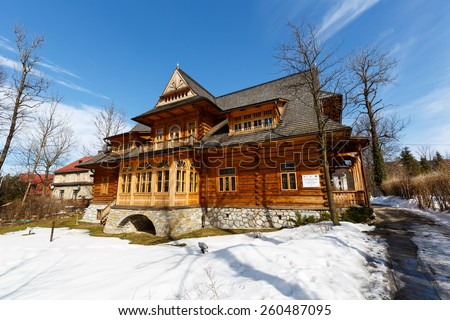 ZAKOPANE, POLAND - MARCH 10, 2015: Villa named Oksza built in Zakopane style of wood for Vincent Korwin Kossakowski in the years 1894 & 1895 by project of Stanislaw Witkiewicz