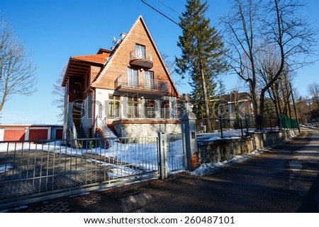 ZAKOPANE, POLAND - MARCH 09, 2015: Villa named Strzelista built in 1929, with historic features listed in the register of architectural heritage