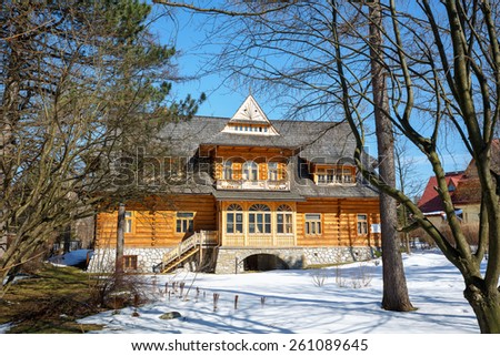ZAKOPANE, POLAND - MARCH 09, 2015: Villa named Oksza built in Zakopane style of wood for Vincent Korwin Kossakowski in the years 1894 & 1895 by project of Stanislaw Witkiewicz